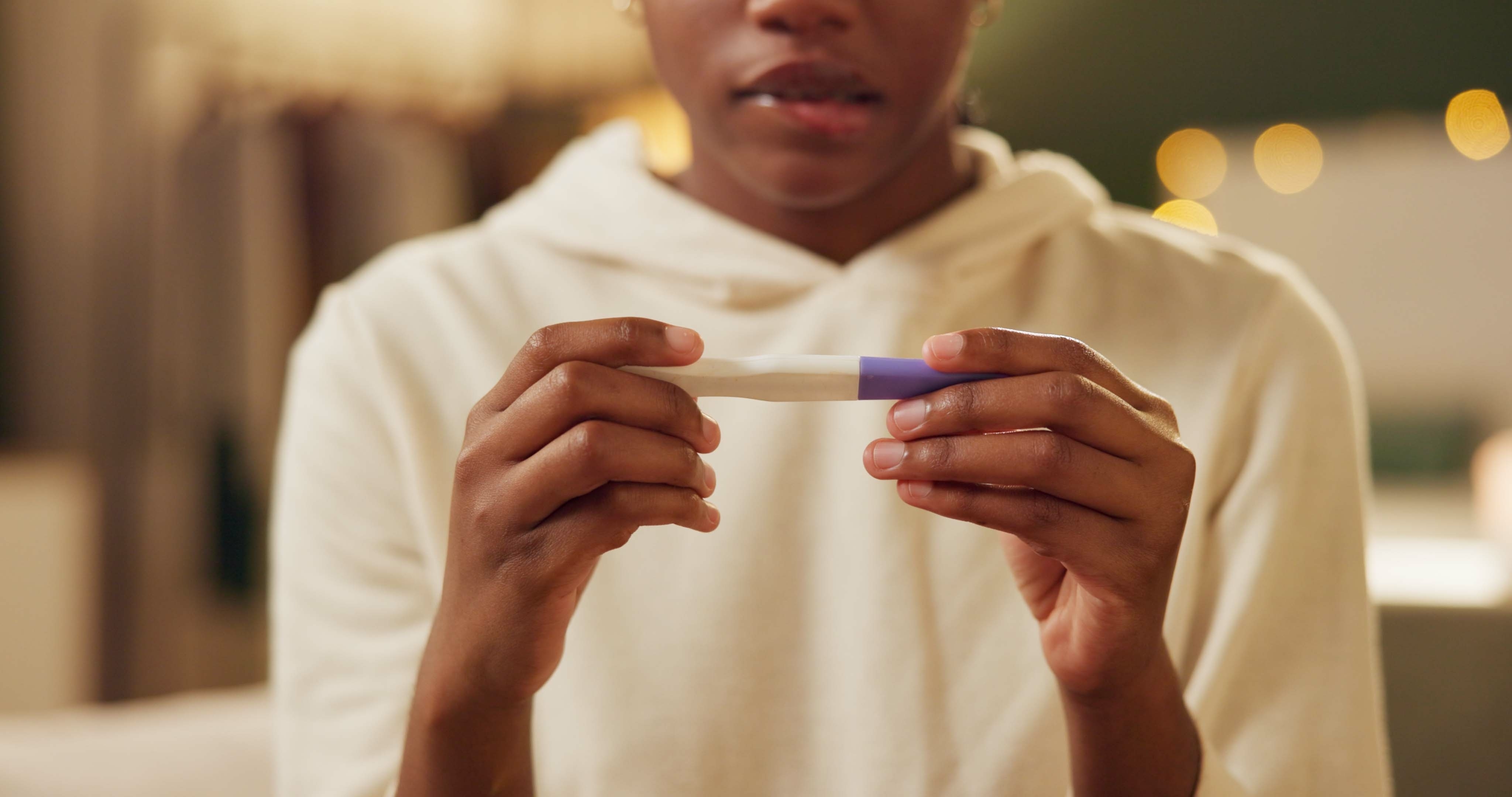Home,,Hands,And,Woman,With,Pregnancy,Test,,Surprise,And,Frustrated