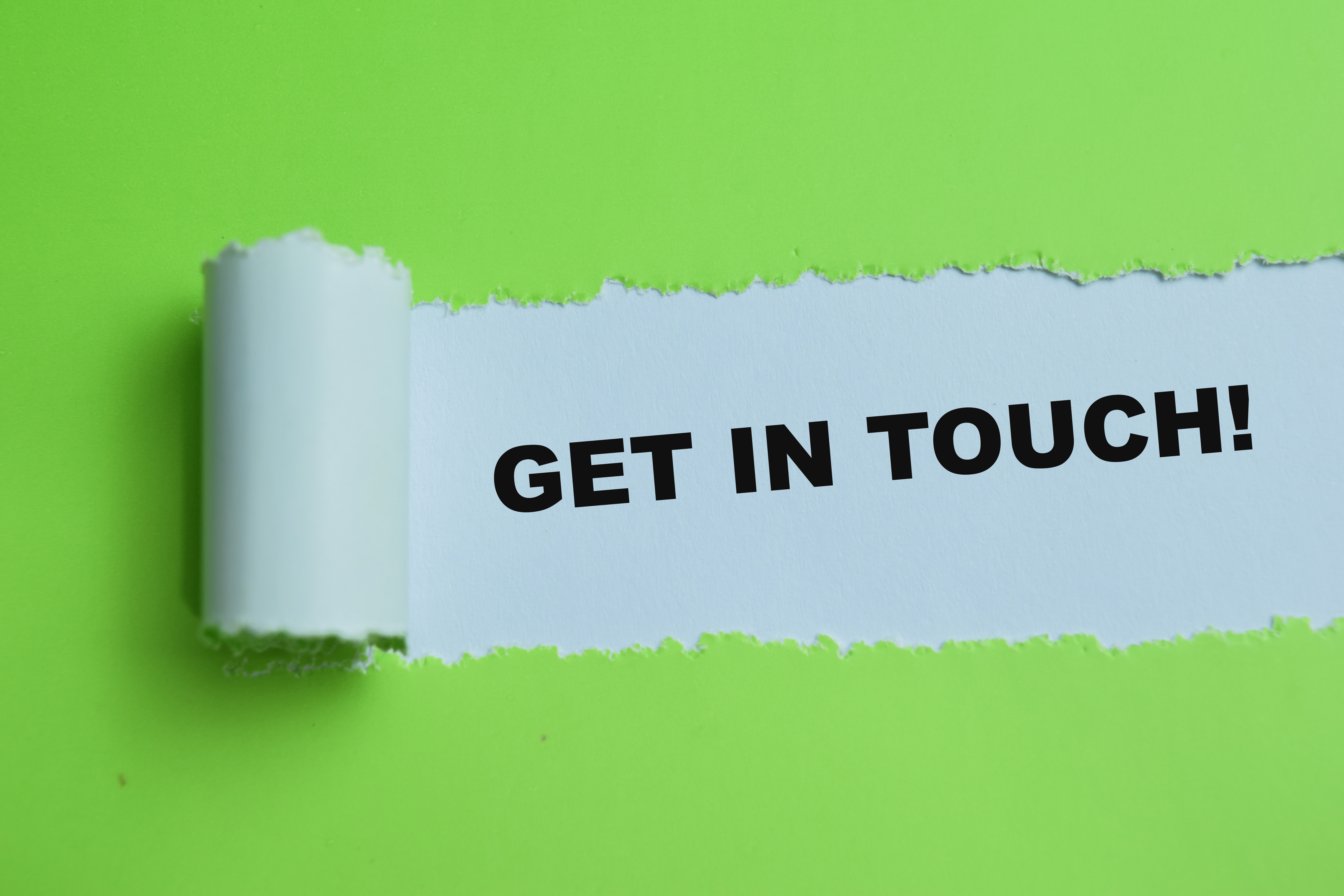 Concept,Of,Get,In,Touch,Text,Written,In,Torn,Paper.